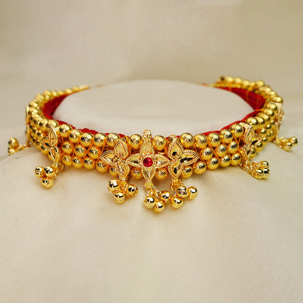 Traditional Kolhapuri Chinchpeti gold choker with Belpan design for bridal look.