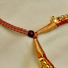 Traditional Kolhapuri Chinchpeti gold choker with Belpan design for bridal look.