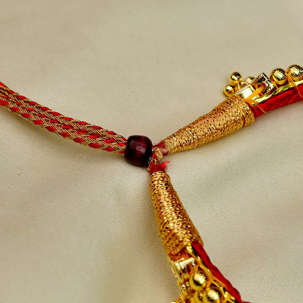 Traditional Kolhapuri Chinchpeti gold choker with Belpan design for bridal look.