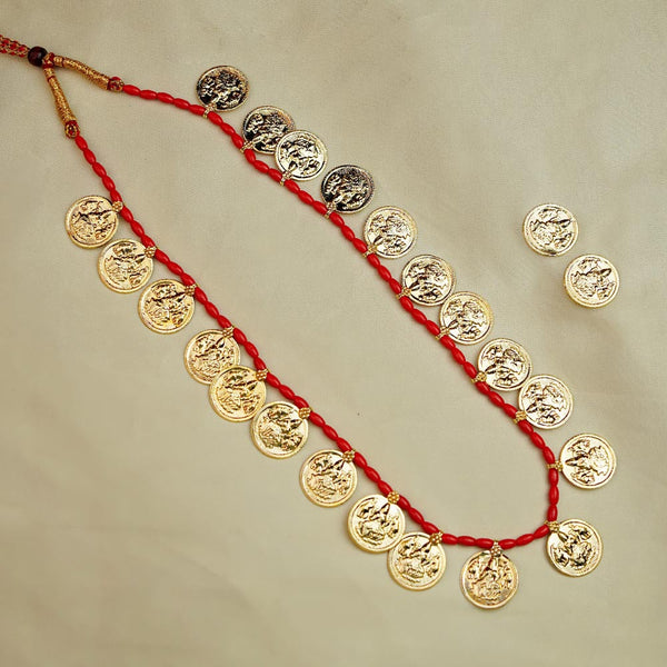 Maharashtrian gold necklace with powla beads and coin detailing.