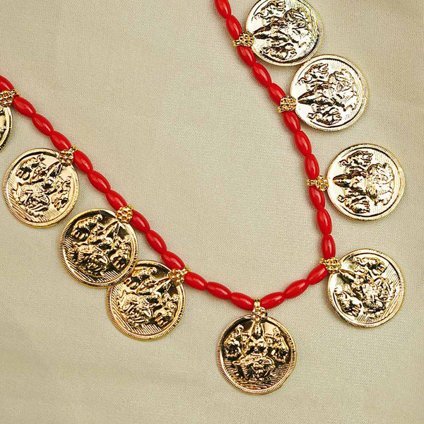 Maharashtrian gold necklace with powla beads and coin detailing.