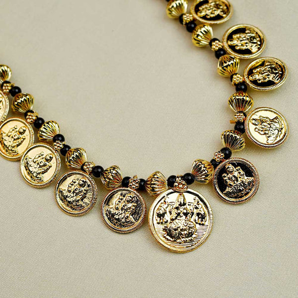 Necklace with Laxmi coins embedded in gold-toned metal for a divine look.