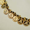 Necklace with Laxmi coins embedded in gold-toned metal for a divine look.