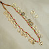 Long mala-style necklace embedded with Laxmi coins and gold finish.