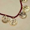 Handcrafted Kolhapuri necklace with Mahalaxmi coins and antique finish.