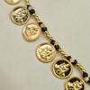 Long gold necklace with Mani beads and Mahalaxmi coin pendants.