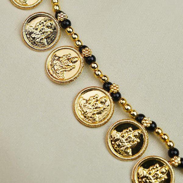 Long gold necklace with Mani beads and Mahalaxmi coin pendants.