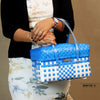 Blue and white handwoven half basket with lid for stylish home storage
