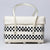 Black and white modern handwoven half basket with lid