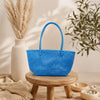 Kalapuri handmade sky blue Koodai tote bag, front view on plain background