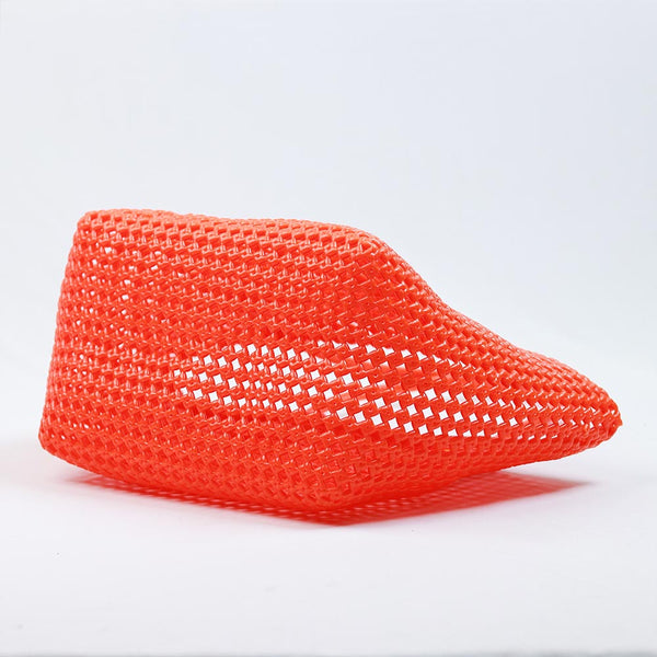 Close-up of woman holding Kalapuri orange Koodai tote bag handle