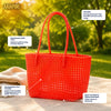 Top view of Kalapuri orange Koodai tote bag showing spacious woven interior