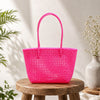 Kalapuri handmade pink Koodai tote bag, front view on plain background