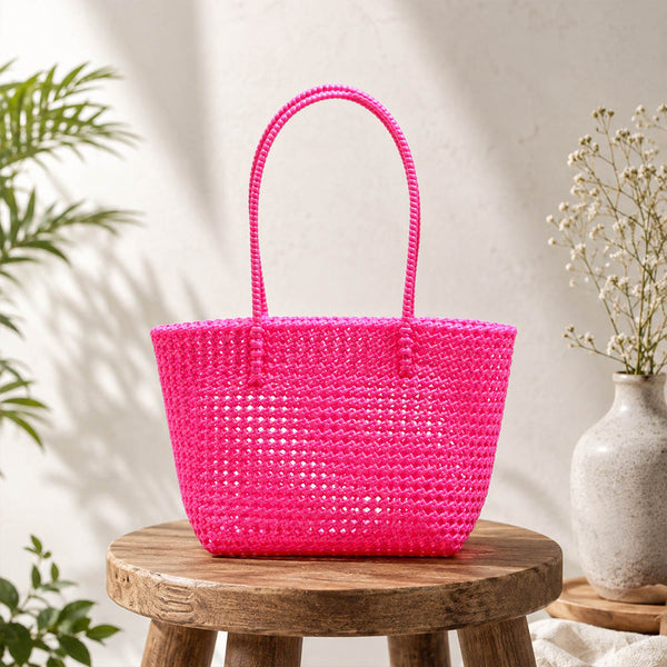 Kalapuri handmade pink Koodai tote bag, front view on plain background