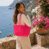 Close-up of handwoven handle detail on Kalapuri pink Koodai tote bag