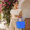 Close-up of handwoven handle detail on Kalapuri cornflower blue Koodai tote bag