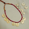 Traditional Kolhapuri necklace with goddess Lakshmi coins and intricate design.