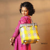 Kalapuri handmade yellow and grey lid top basket chic two-tone woven storage.