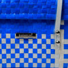 Blue and white handwoven half basket with lid for stylish home storage