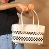 Black and white modern handwoven half basket with lid