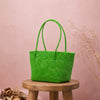 Kalapuri handmade bright green Koodai tote bag, front view on plain background
