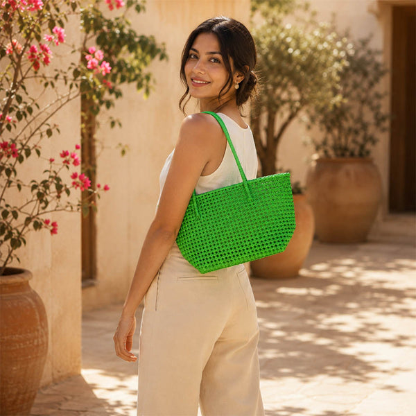 Close-up of handwoven handle detail on Kalapuri bright green Koodai tote bag