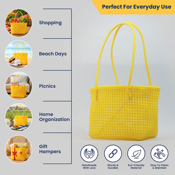 Kalapuri handmade yellow Koodai tote bag, angled view showing woven texture