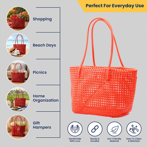 Kalapuri handmade orange Koodai tote bag, angled view showing woven texture