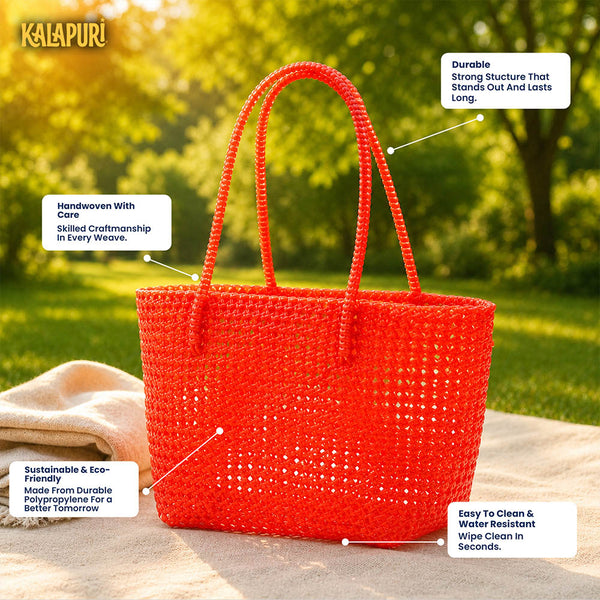 Top view of Kalapuri orange Koodai tote bag showing spacious woven interior