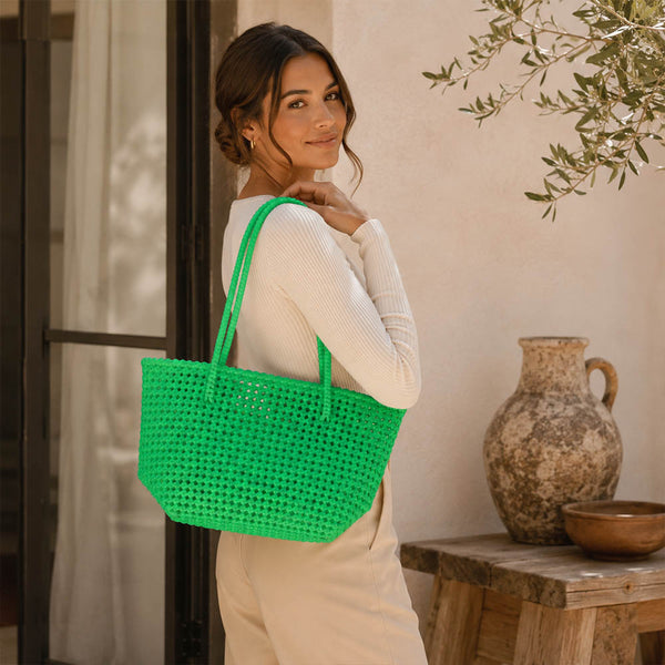 Close-up of handwoven handle detail on Kalapuri mint green Koodai tote bag