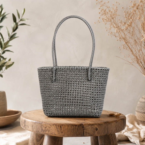 Kalapuri handmade gray Koodai tote bag, front view on plain background