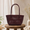 Kalapuri handmade maroon Koodai tote bag, front view on plain background