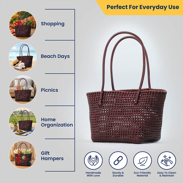 Kalapuri handmade maroon Koodai tote bag, angled view showing woven texture