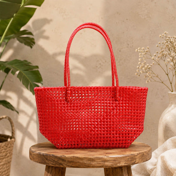 Kalapuri handmade red Koodai tote bag, front view on plain background
