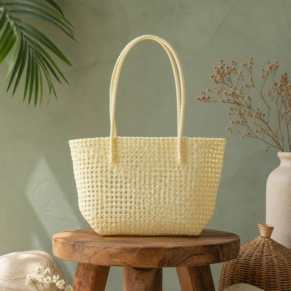 Kalapuri handmade cream Koodai tote bag, front view on plain background