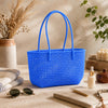 Kalapuri handmade cornflower blue Koodai tote bag, front view on plain background