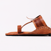 Brown sandal with a white background