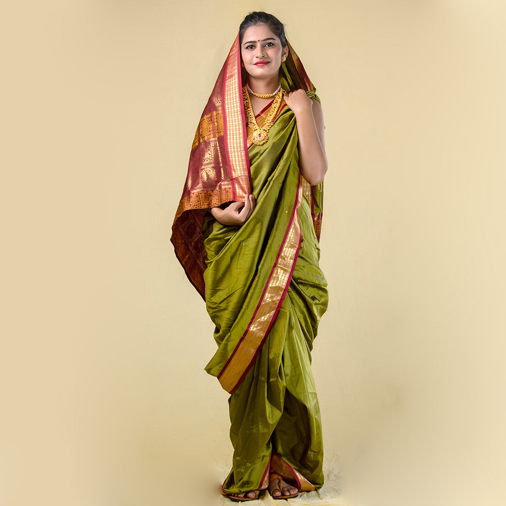 THE Metalic Blue with Maroon contrast Boarder in Nuvari readymade stitched  saree.