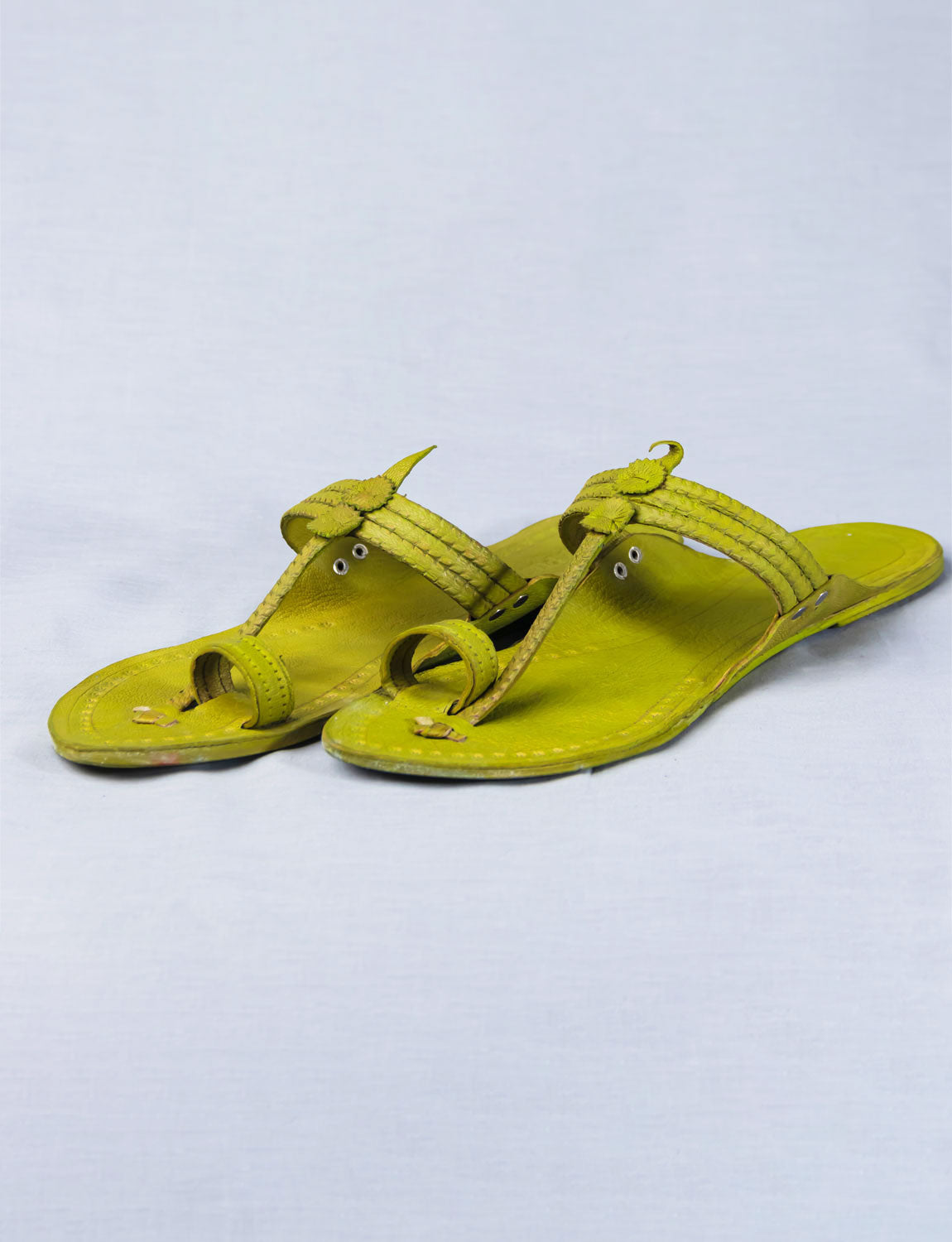 Braided Beauty: Kolhapuri Chappals with Floral Die Punch