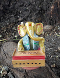 Multicoloured Handcrafted Ganesha Idol with Harmonium.