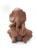 Beige Terracotta Ganesha playing tabla